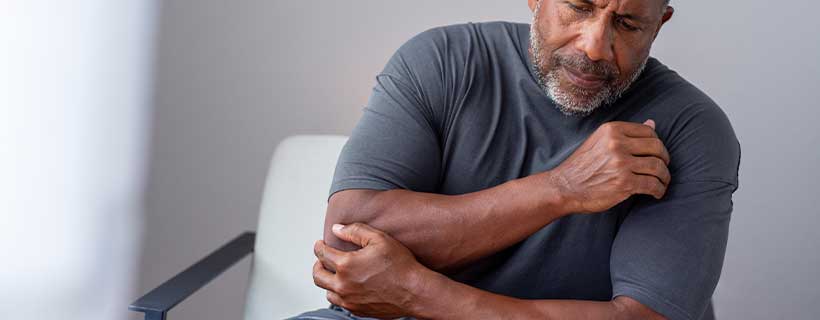 patient needing elbow pain in need of shockwave therapy in San Diego